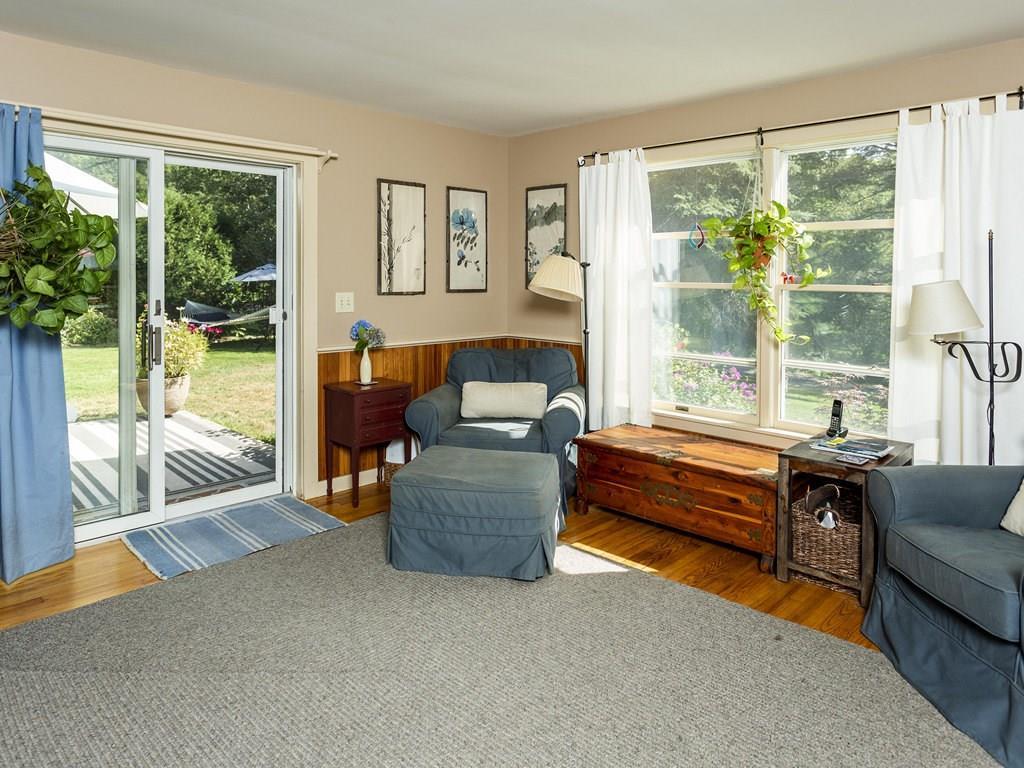17 Highland Ridge Road Boothbay, ME 04537 - Photo 5 of 34 The living room with bead board,...