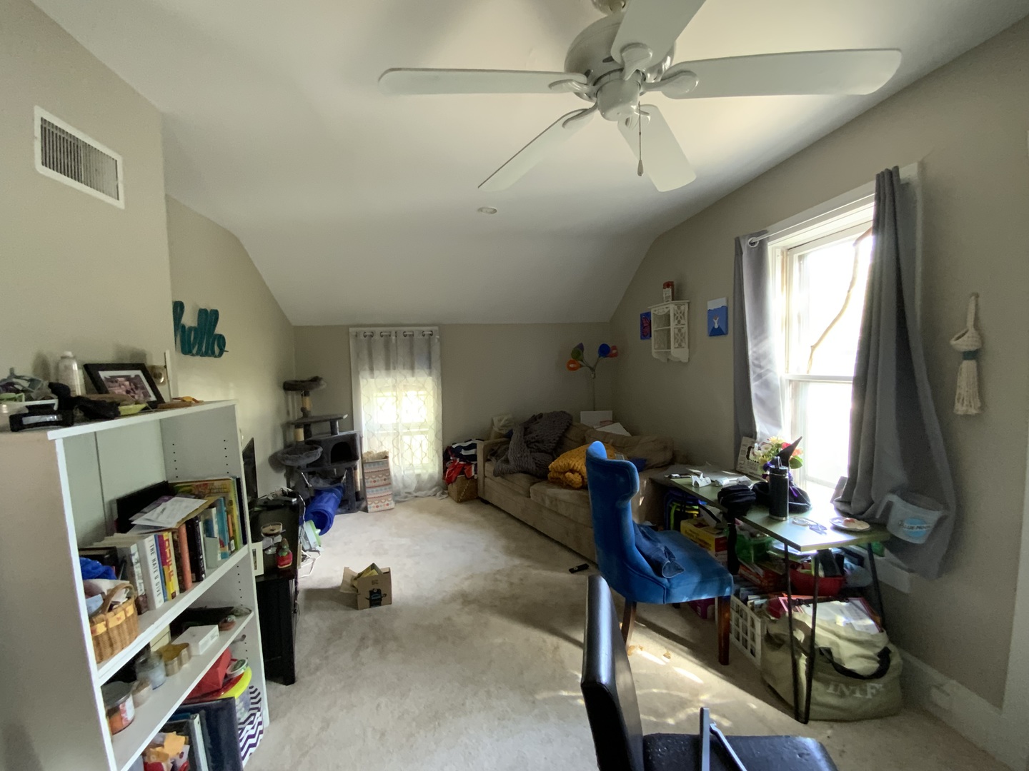 404 South Batavia Avenue Batavia, IL 60510 - Photo 17 of 37 a living room with furniture and a book shelf