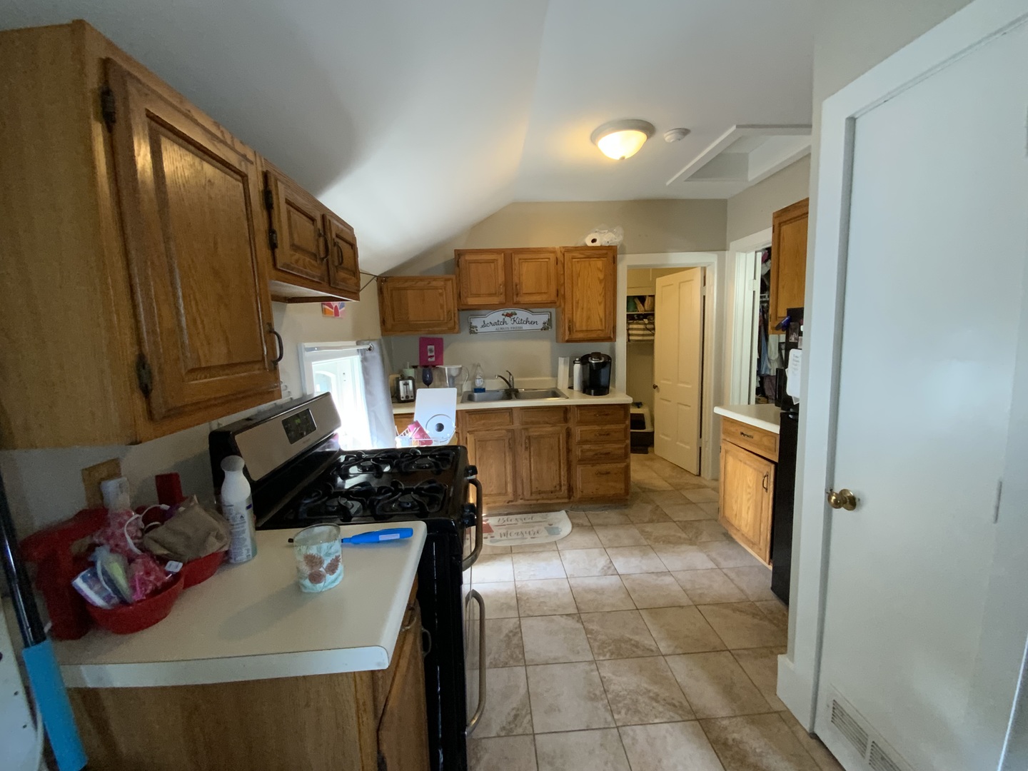 404 South Batavia Avenue Batavia, IL 60510 - Photo 18 of 37 a kitchen with stainless steel appliances granite countertop a sink stove and cabinets