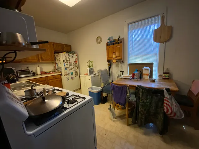 a room with furniture and a flat screen tv