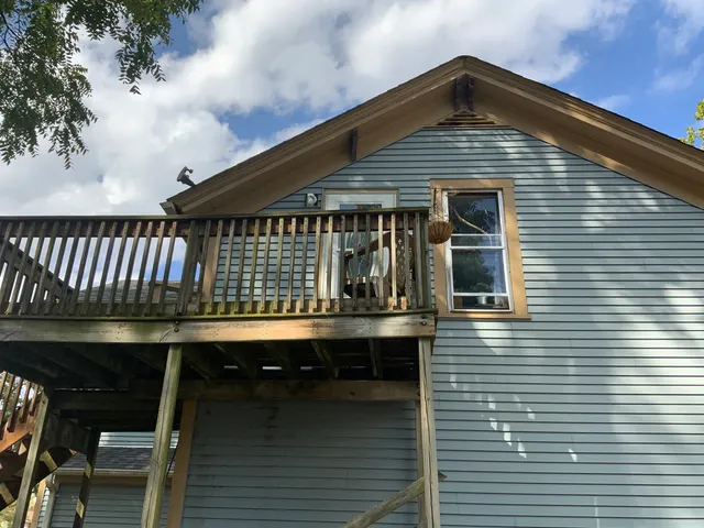 a front view of a house with balcony