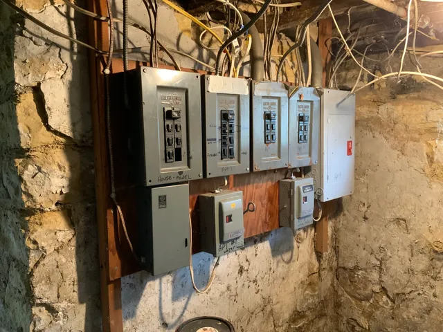 a view of a house with a snow in the background