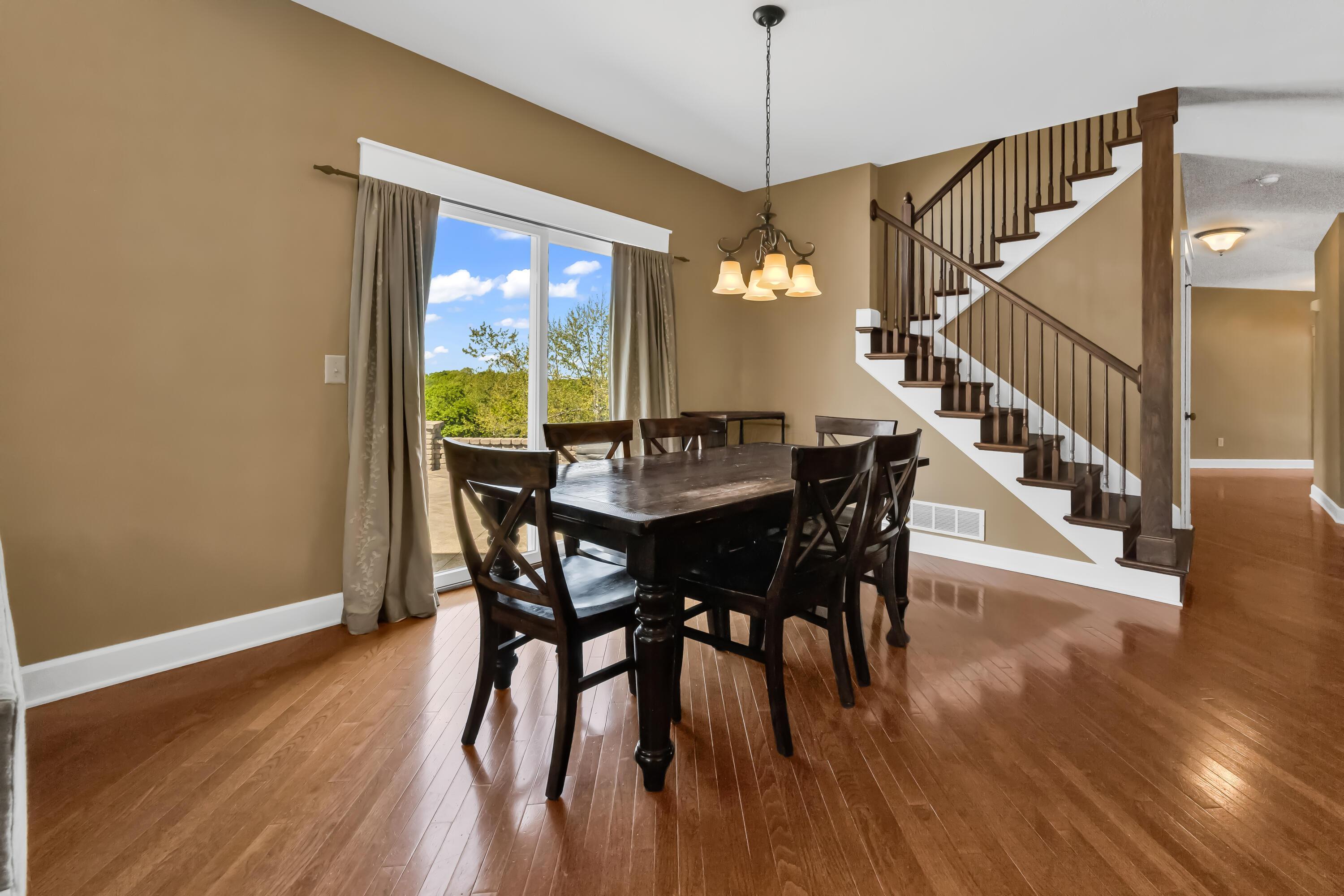 16689 Bailor Road Laurelville, OH 43135 - Photo 24 of 73 • Hardwood flooring
• Tan painted walls
• Chandelier
• Double sliding
doors to patio