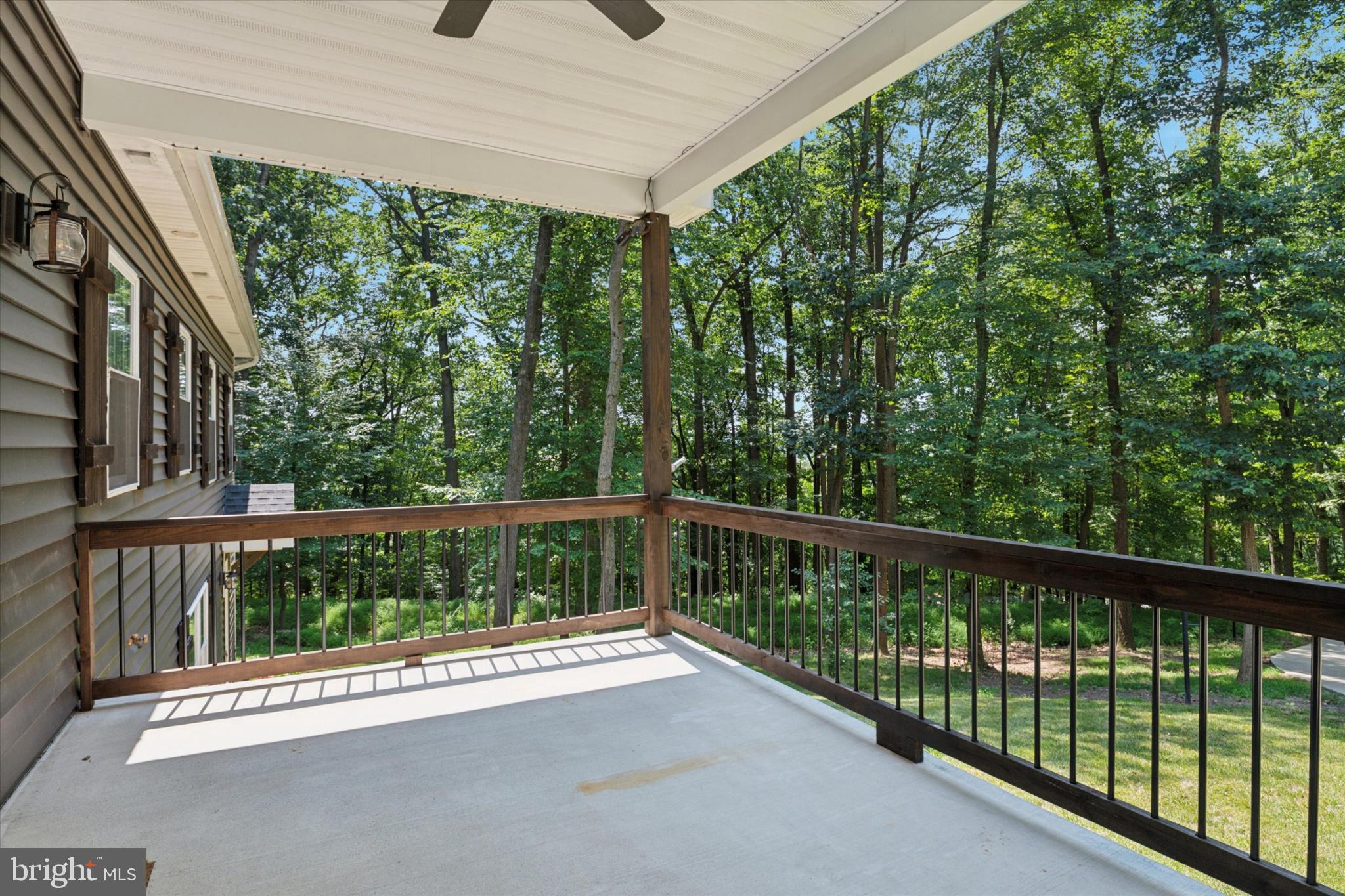 951 North Bailey Road Downingtown, PA 19335 - Photo 28 of 35 Serene deck overlooking lush greenery.