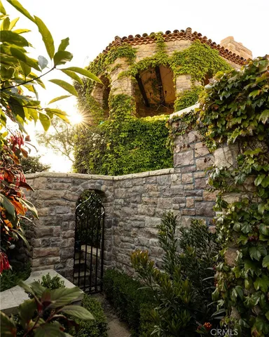 an aerial view of a house with a outdoor space