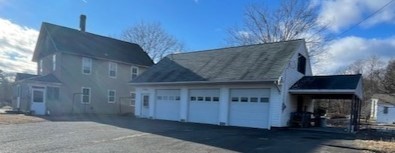 604 Bridge Road Northampton, MA 01060 - Photo 1 of 9 a front view of a house with a yard