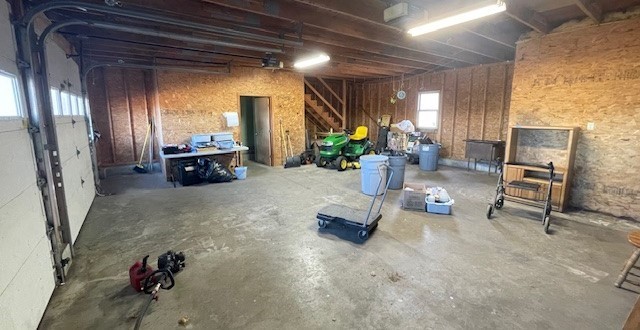 604 Bridge Road Northampton, MA 01060 - Photo 5 of 9 a living room with furniture gym equipment and a chandelier