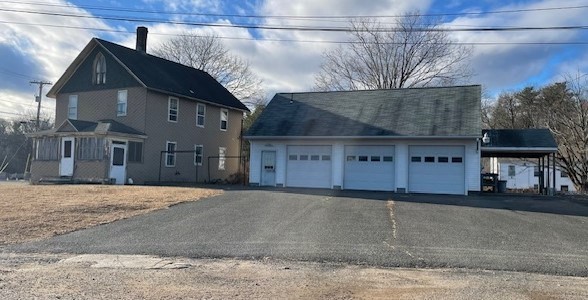 604 Bridge Road Northampton, MA 01060 - Photo 8 of 9 a front view of a house with a yard