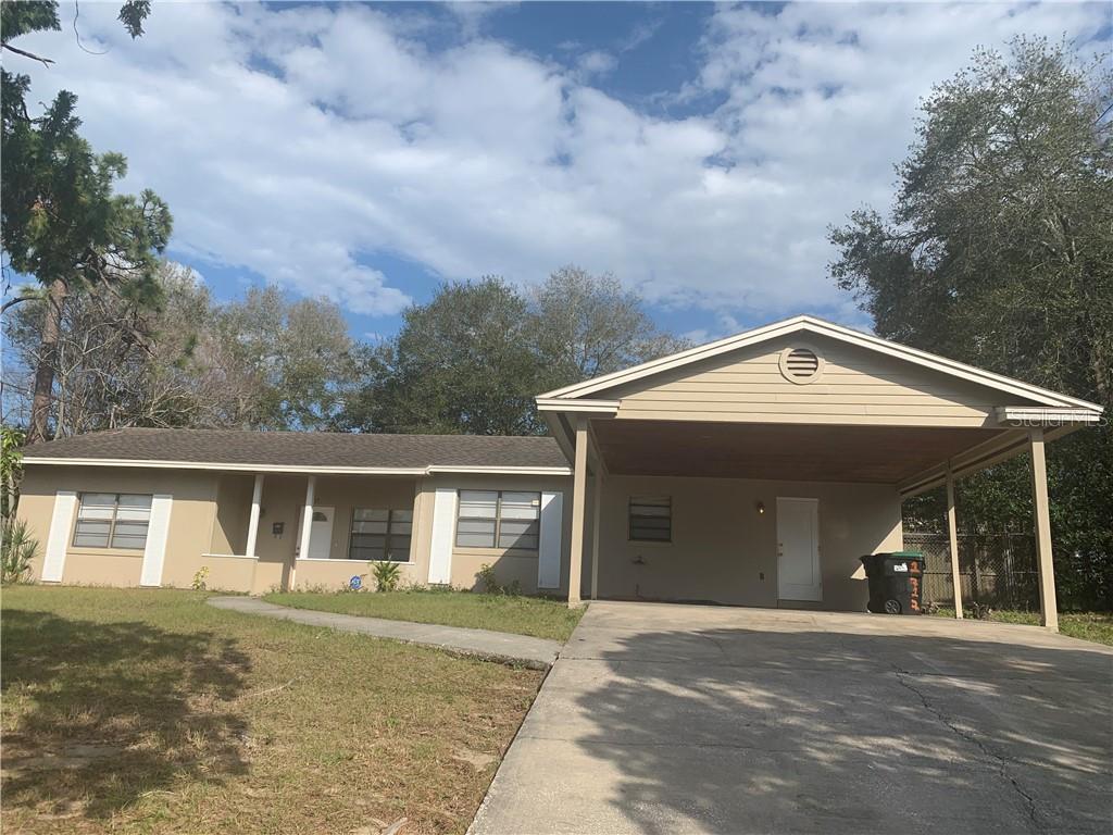 1717 Glendale Road Orlando, FL 32808 - Photo 1 of 1 a view of a house with backyard and garden