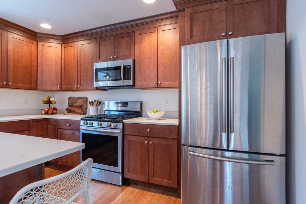 188 South Road Pepperell, MA 01463 - Photo 13 of 41 a kitchen with stainless steel appliances granite countertop a refrigerator stove and sink