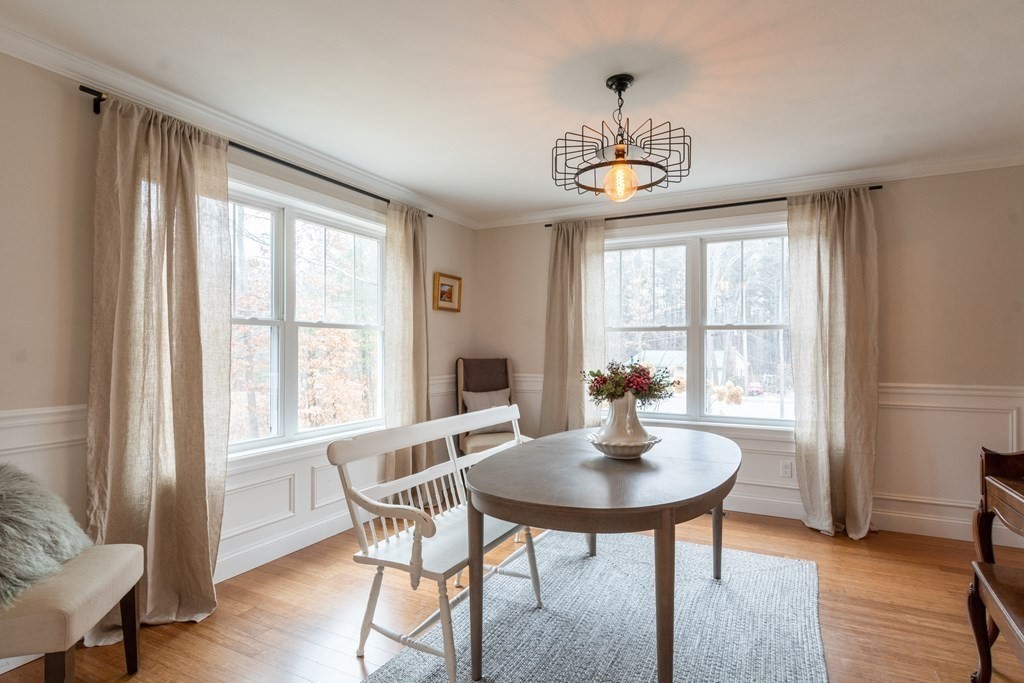 188 South Road Pepperell, MA 01463 - Photo 17 of 41 a view of a dining room with furniture window and wooden floor