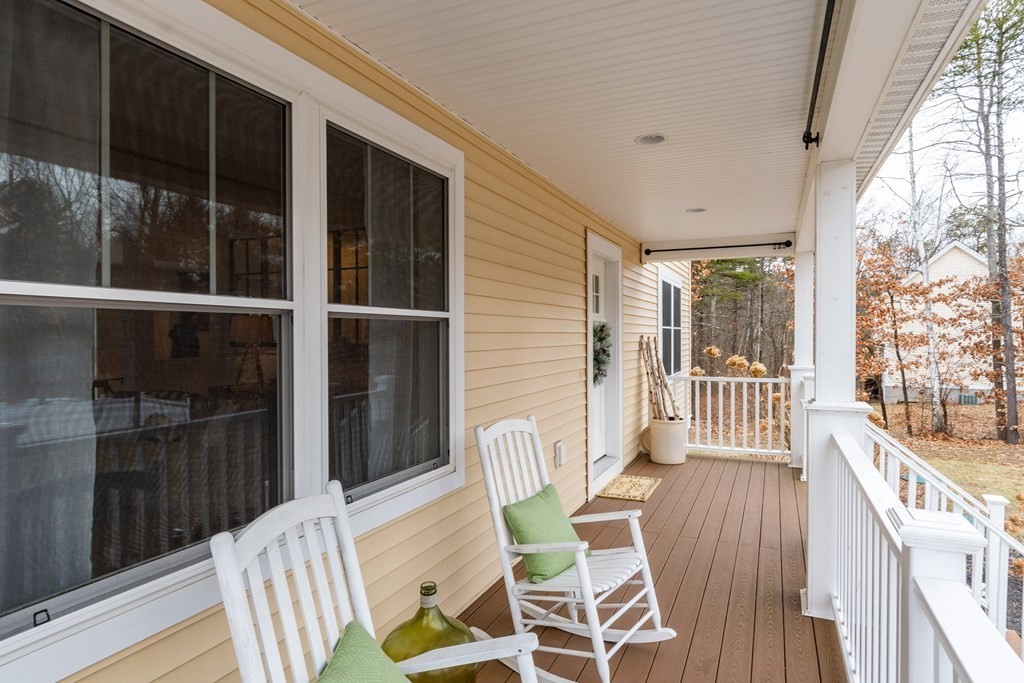 188 South Road Pepperell, MA 01463 - Photo 37 of 41 a view of a chair and tables in the balcony