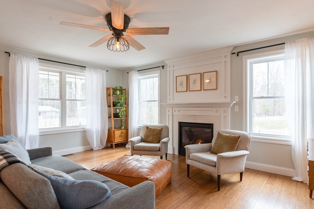 188 South Road Pepperell, MA 01463 - Photo 5 of 41 a living room with furniture and a fireplace
