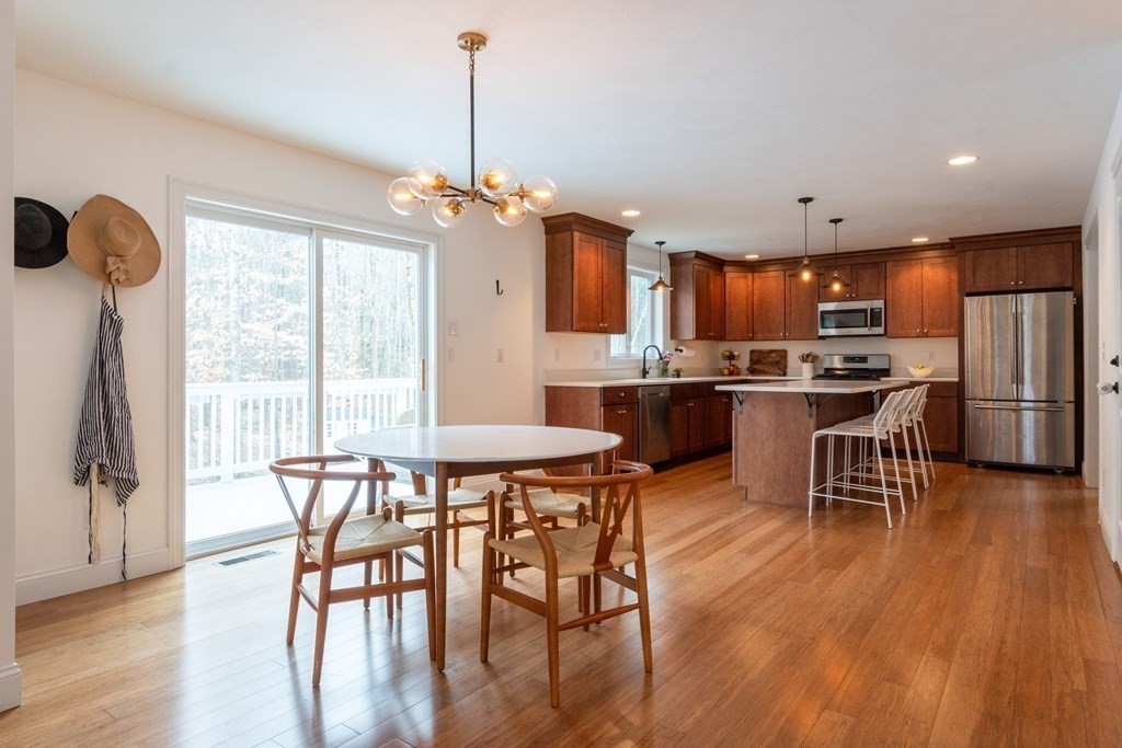 188 South Road Pepperell, MA 01463 - Photo 10 of 41 a view of a dining room with furniture window and wooden floor