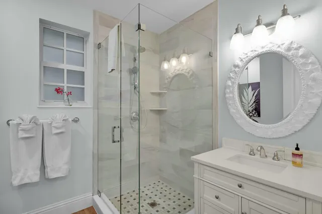 a bedroom with bed and balcony