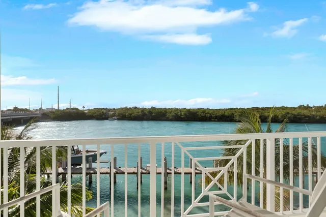 a view of a lake from a balcony