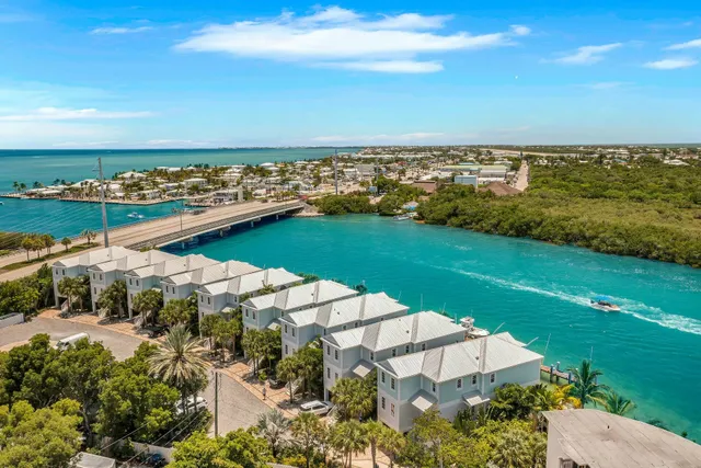 an aerial view of ocean residential houses with outdoor space