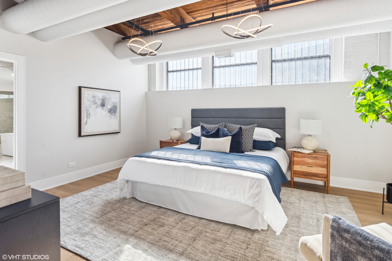 411 South Sangamon Street, Unit B Chicago, IL 60607 - Photo 14 of 24 a bedroom with bed and a window