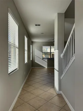 a view of entryway and hall with a window