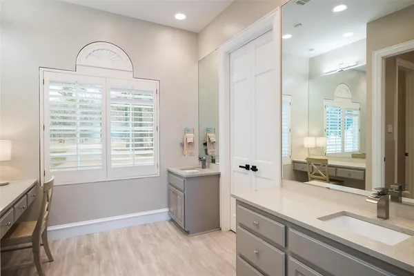 a bathroom with a bathtub and a sink