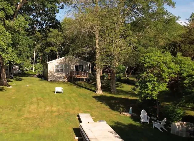 a view of a house with swimming pool