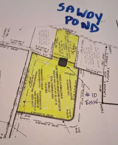 a view of a house with a yard and stairs