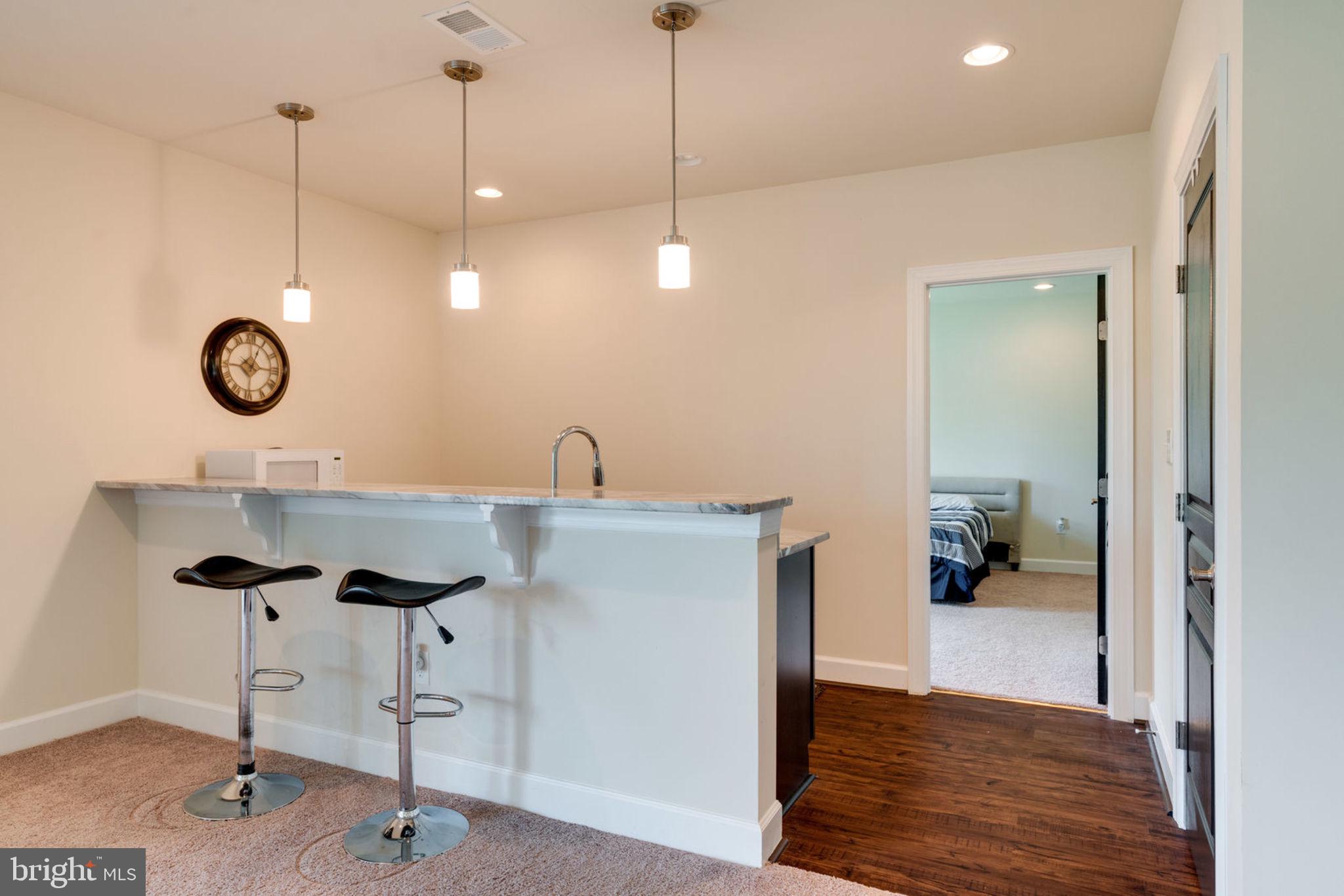 7516 Tangerine Place Lorton, VA 22079 - Photo 29 of 38 Basement kitchen area with granite counters