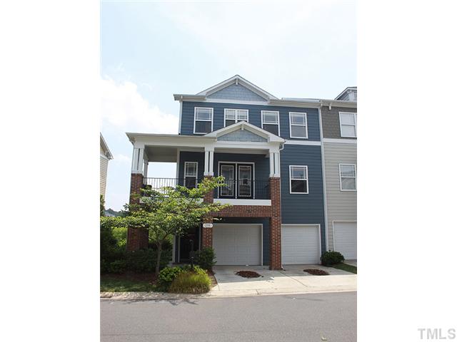 231 Broadgait Brae Road Cary, NC 27519 - Photo 1 of 3 a front view of a house with a yard