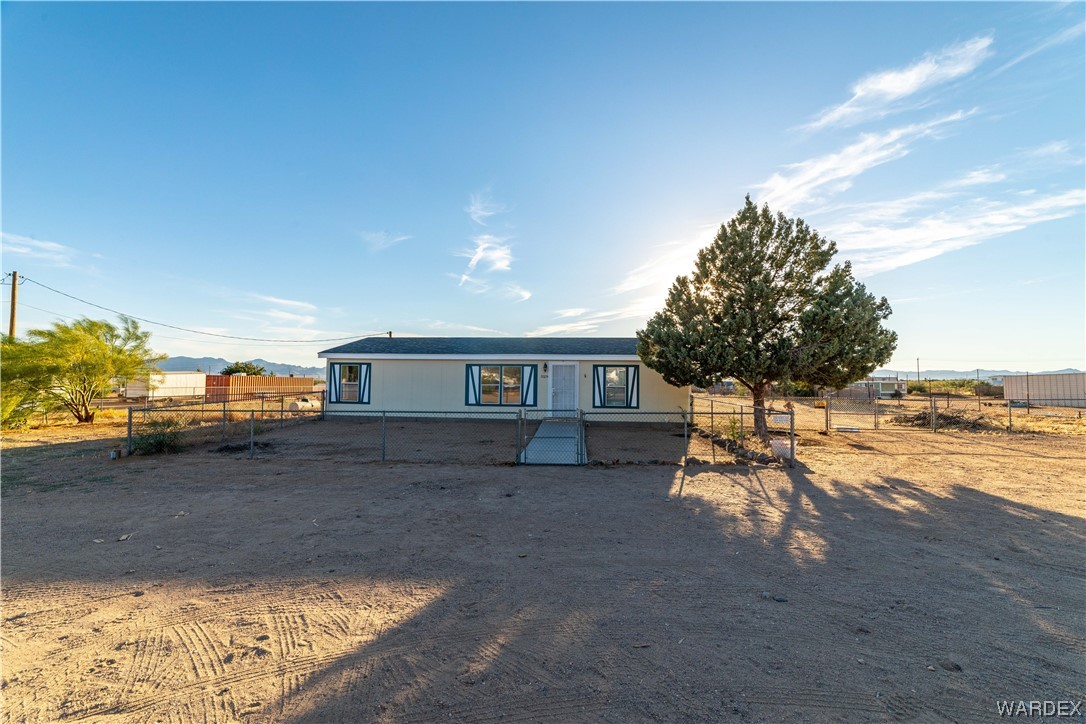 3329 Heber Road Golden Valley, AZ 86413 - Photo 1 of 52 a view of a house with a yard