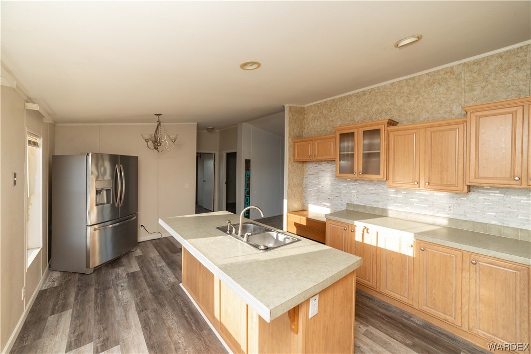 3329 Heber Road Golden Valley, AZ 86413 - Photo 30 of 52 a kitchen with a sink and refrigerator