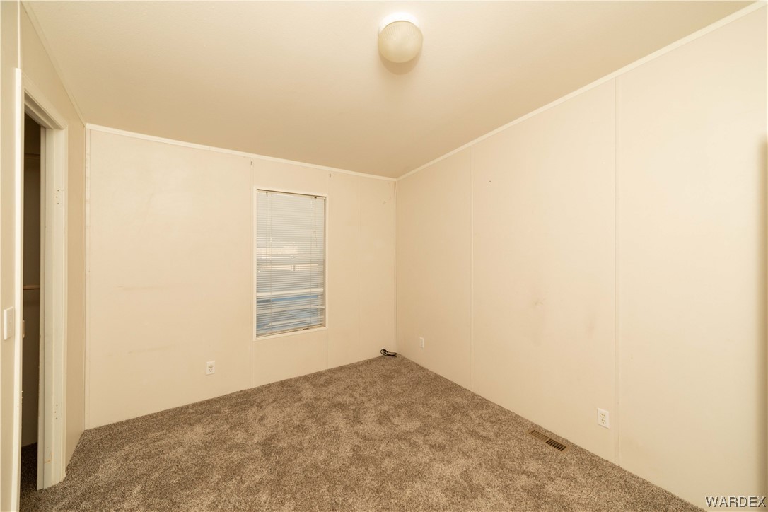 3329 Heber Road Golden Valley, AZ 86413 - Photo 31 of 52 a view of empty room with window
