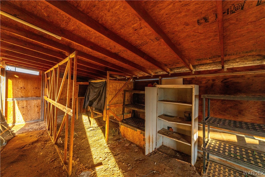 3329 Heber Road Golden Valley, AZ 86413 - Photo 45 of 52 a view of an empty room with wooden floor