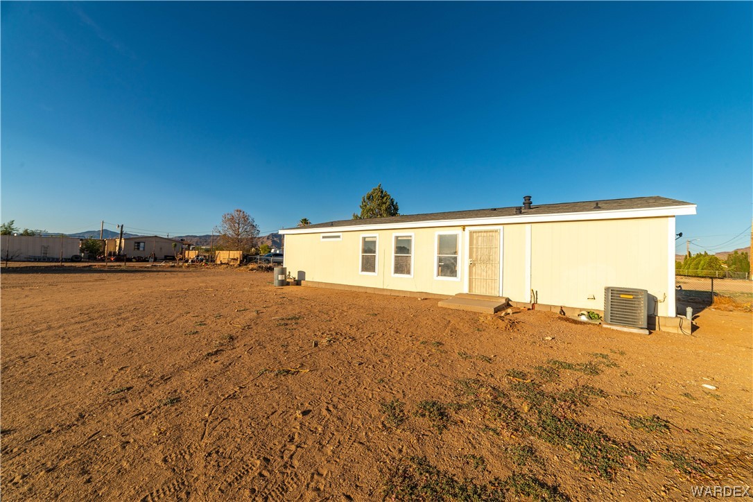 3329 Heber Road Golden Valley, AZ 86413 - Photo 7 of 52 a view of a house with a patio