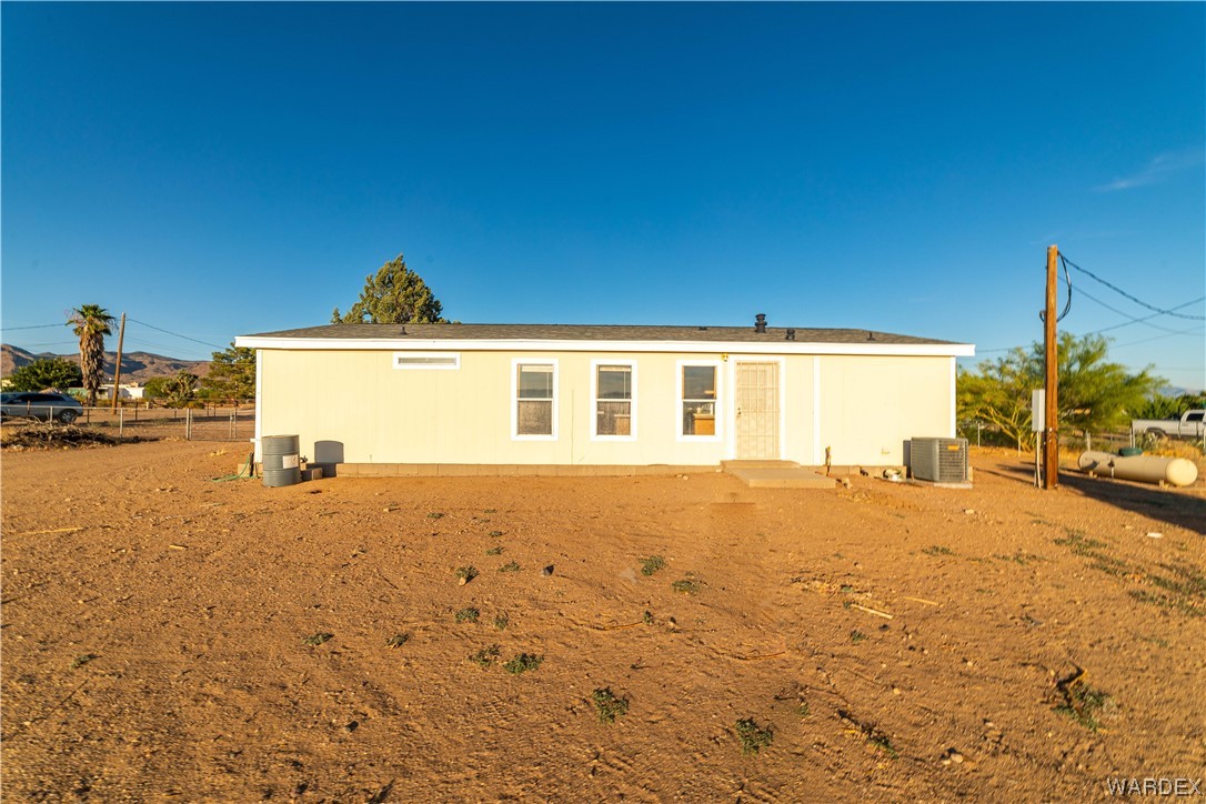 3329 Heber Road Golden Valley, AZ 86413 - Photo 8 of 52 a view of a house with a snow