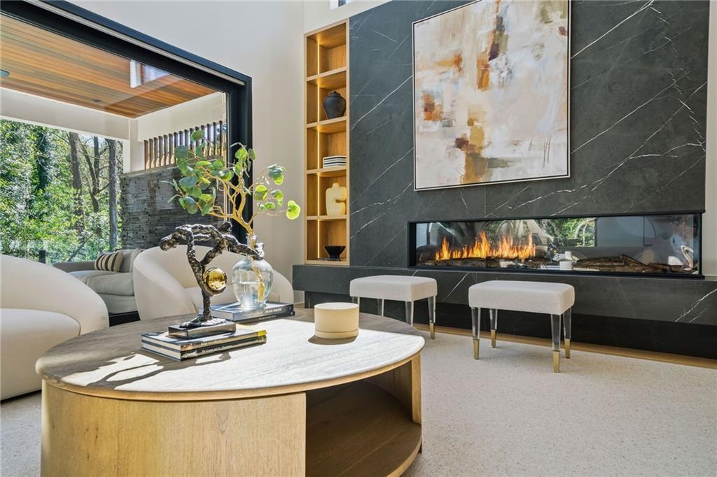 1185 Houston Mill Road Northeast Atlanta, GA 30329 - Photo 29 of 78 a living room with furniture and a potted plant