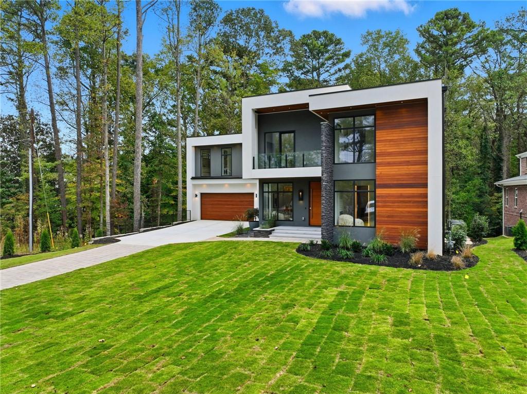 1185 Houston Mill Road Northeast Atlanta, GA 30329 - Photo 3 of 78 a front view of a house with a yard