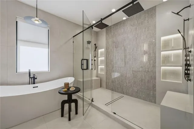 a bathroom with a sink toilet and mirror