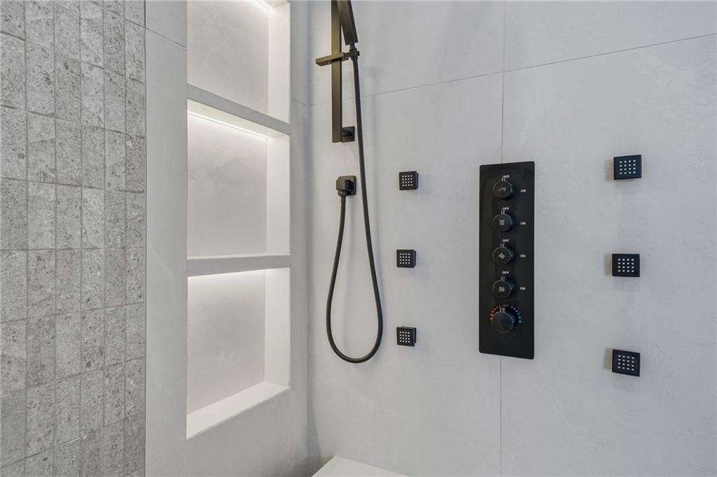 1185 Houston Mill Road Northeast Atlanta, GA 30329 - Photo 46 of 78 a bathroom with a glass shower door