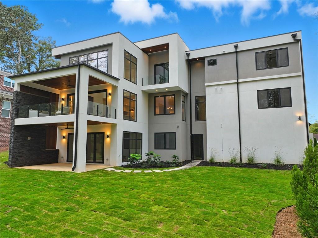 1185 Houston Mill Road Northeast Atlanta, GA 30329 - Photo 69 of 78 a front view of a house with a yard