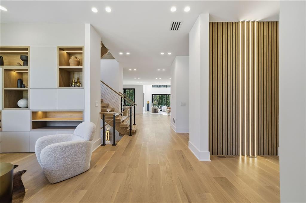 1185 Houston Mill Road Northeast Atlanta, GA 30329 - Photo 10 of 78 a living room with furniture and a wooden floor