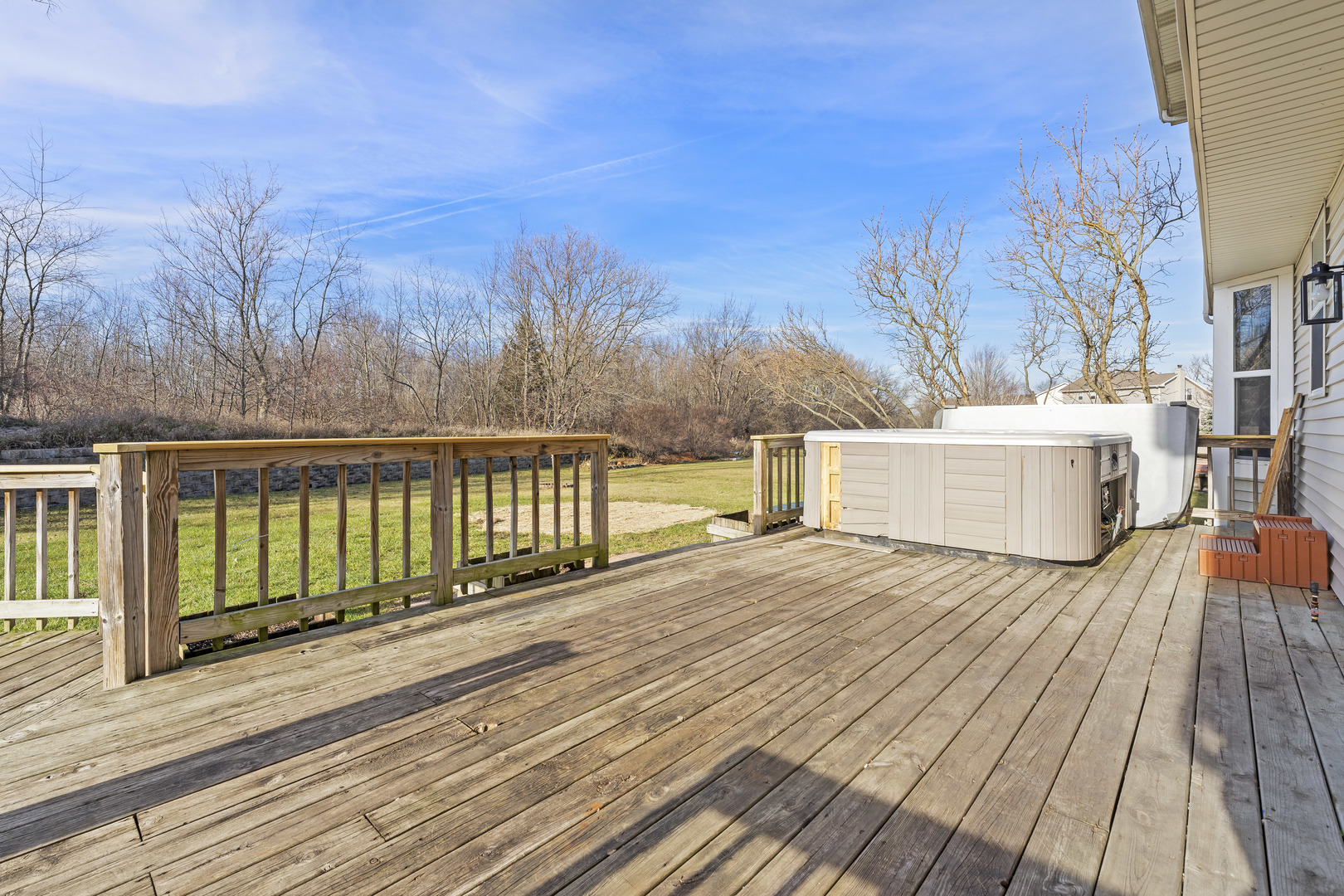 32804 Bending Creek Road McHenry, IL 60051 - Photo 35 of 42 a view of wooden deck and a lake view