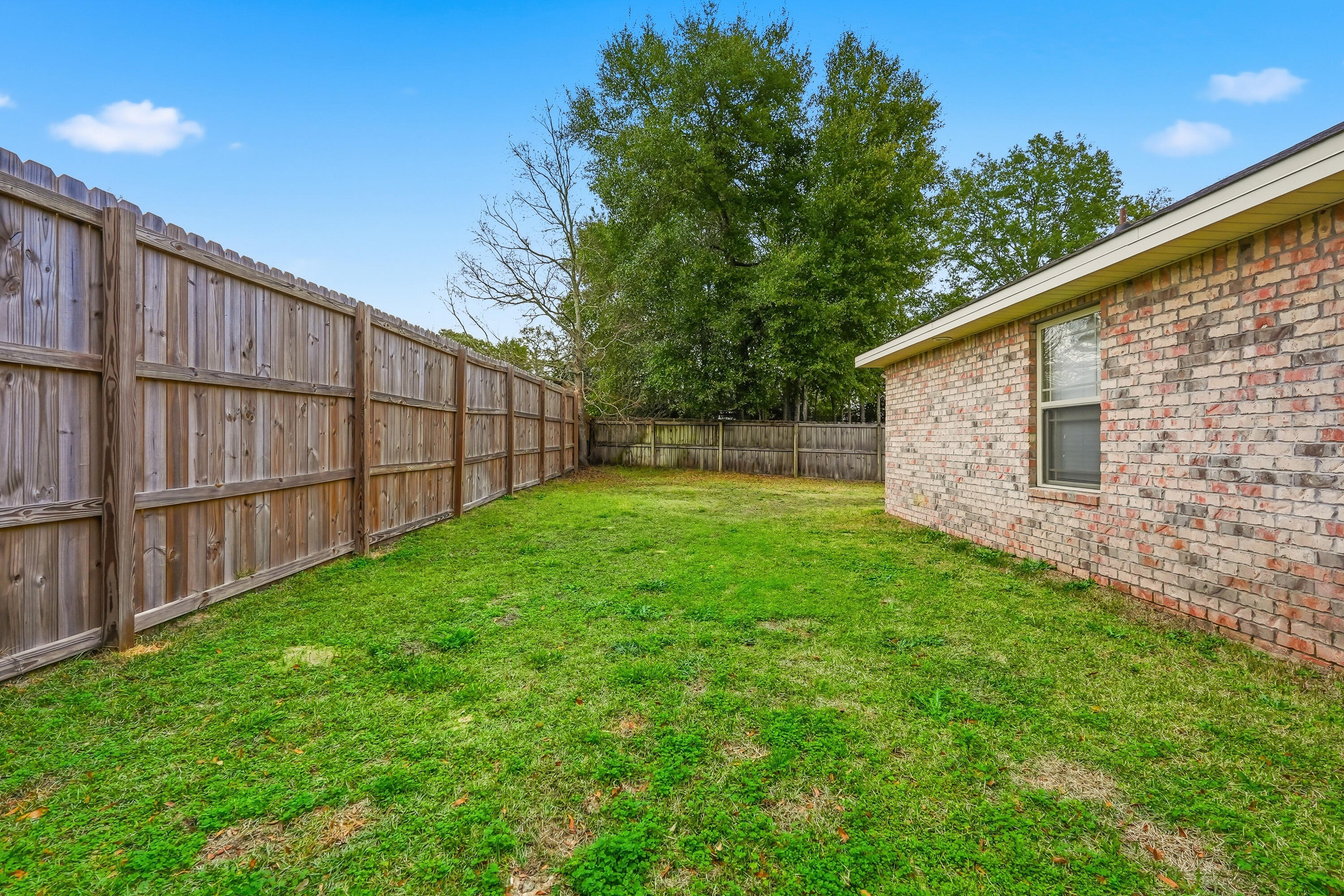516 Grand Ridge Drive Crestview, FL 32539 - Photo 29 of 34 Backyard view