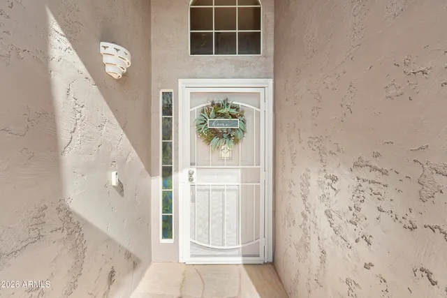 a kitchen with a stove a sink a microwave and wooden cabinets