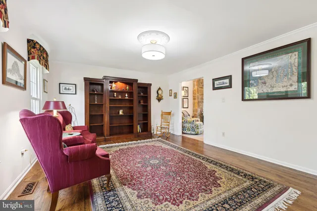 a living room with furniture and window