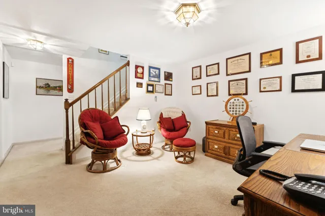 a room with furniture and air hockey table