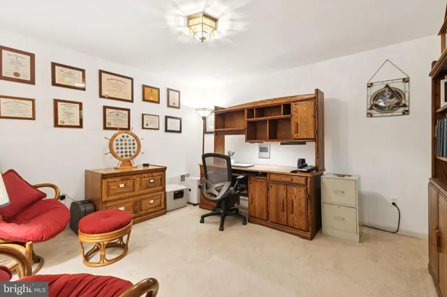 a view of a workspace with furniture