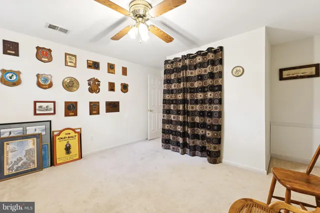 a view of livingroom with furniture and natural light