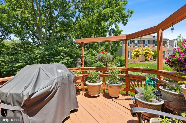 a view of a chairs and a table in the patio