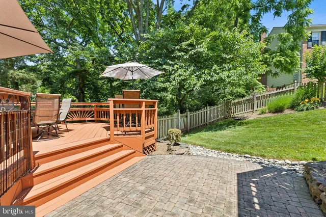 a view of a chair and table of the house
