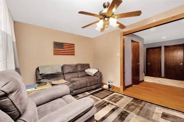 a bed room with a bed and a chandelier